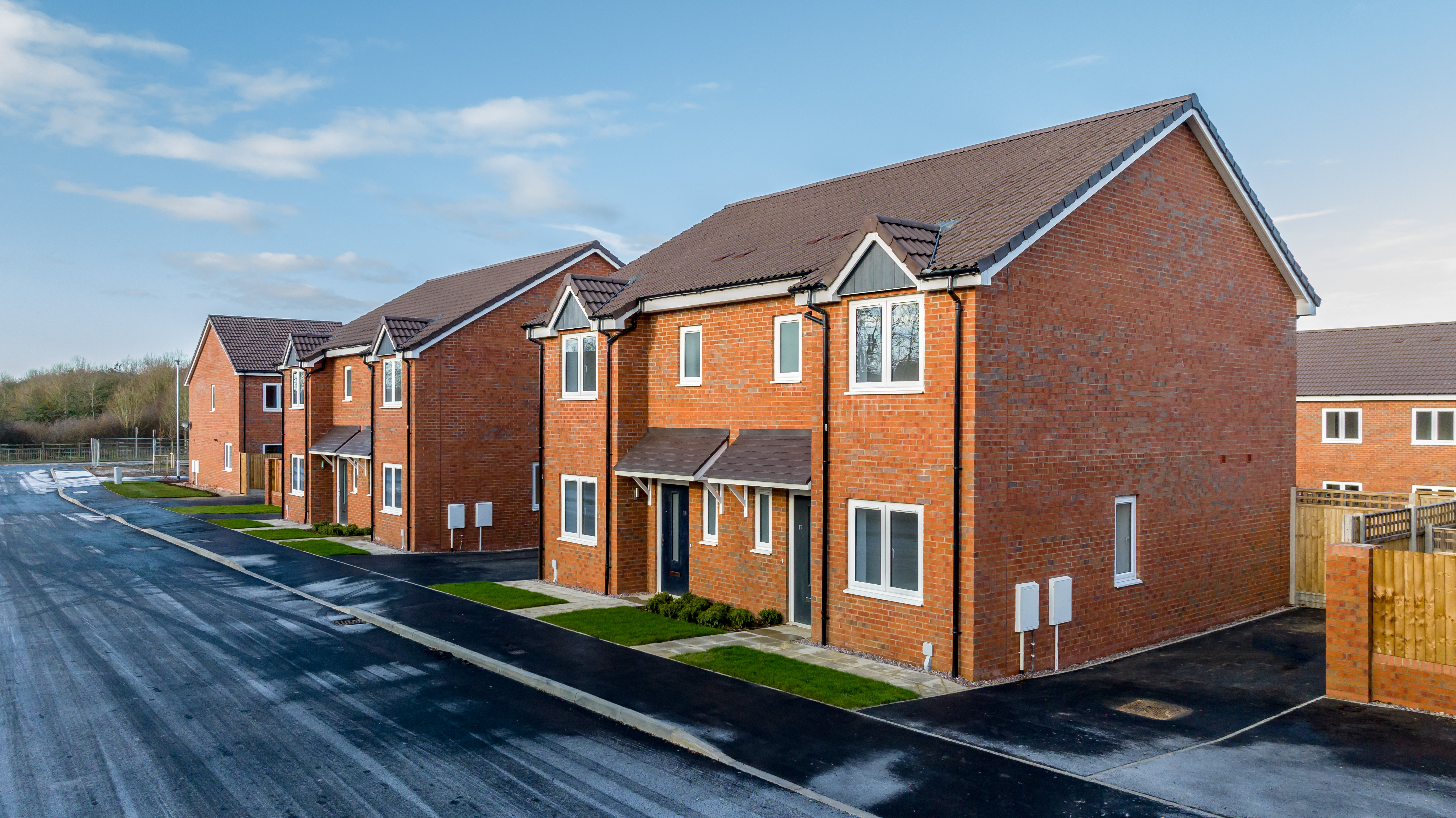 Photo of several new semi-detached homes at Banbury Lane, taken on a frosty day