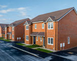 Photo of several new semi-detached homes at Banbury Lane, taken on a frosty day