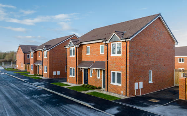 Photo of several new semi-detached homes at Banbury Lane, taken on a frosty day
