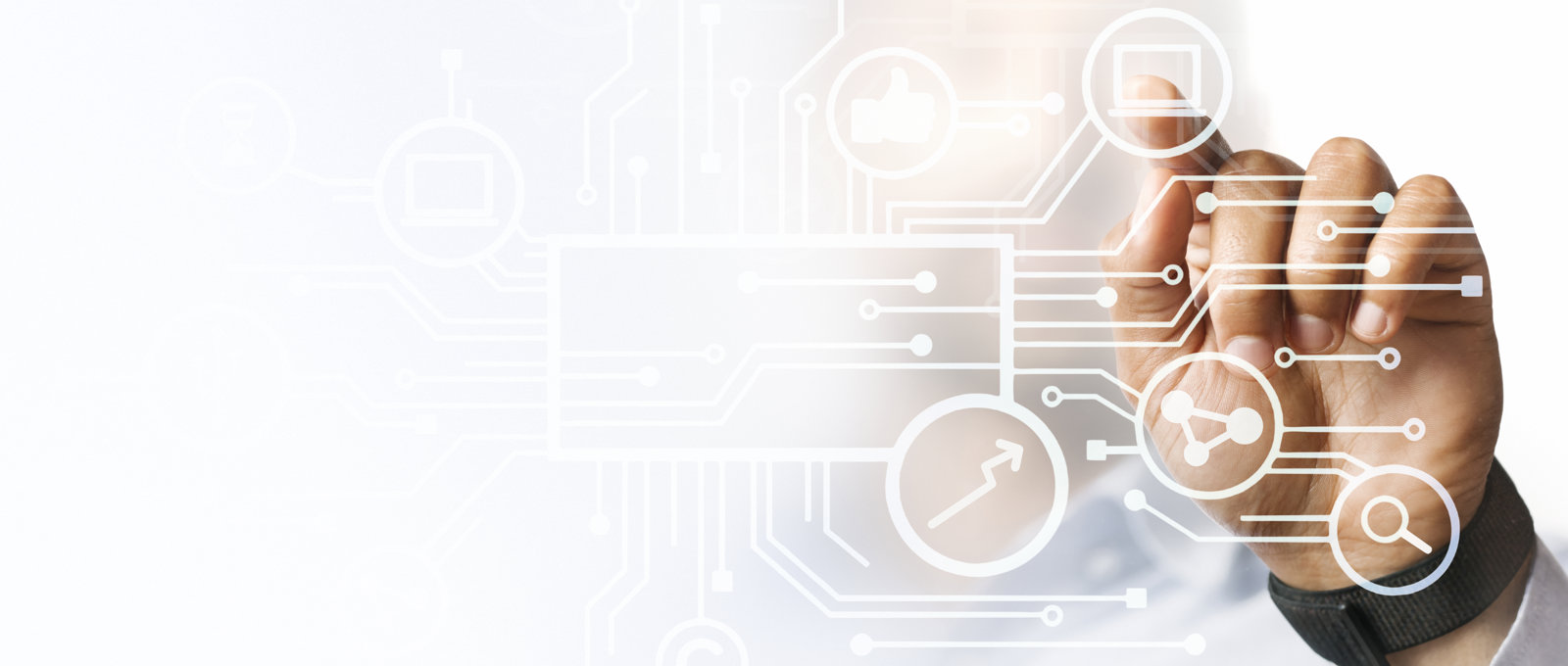 Close up photo of a frosted glass screen that has some white diagrams printed on it that look like electrical circuits. We can see a blurred image of a man behind the glass and he is touching the glass with one hand