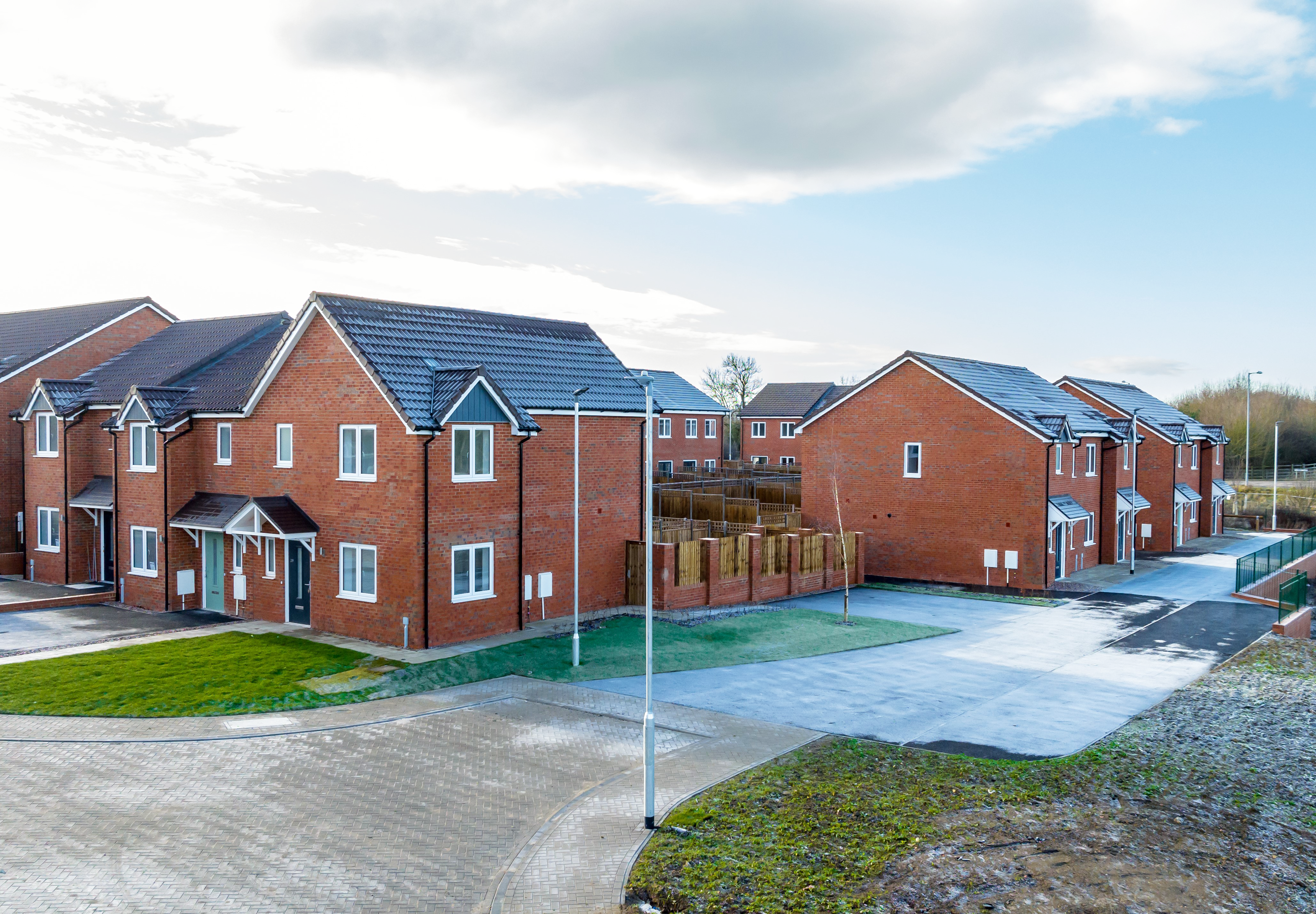 Photograph taken from a high viewpoint of some of the new homes on Banbury Lane, taken on a frosty day