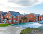 Photograph taken from a high viewpoint of some of the new homes on Banbury Lane, taken on a frosty day